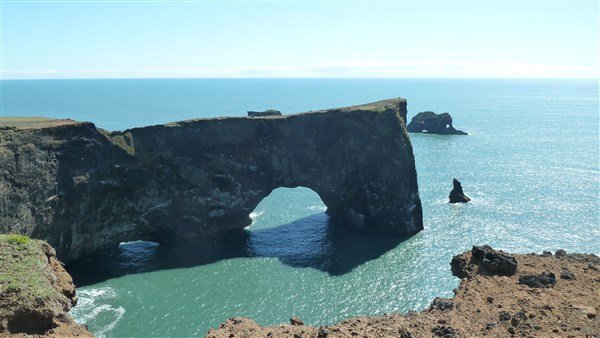 Island - mezi ledovci, sopkami a horkými prameny se zatměním Slunce